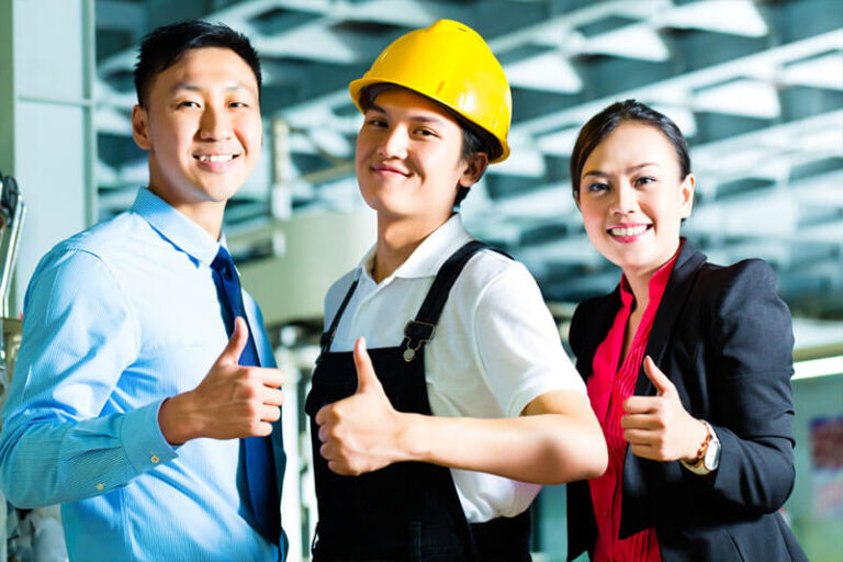 3 employee from different fields wearing their uniform, doing a thumbs up