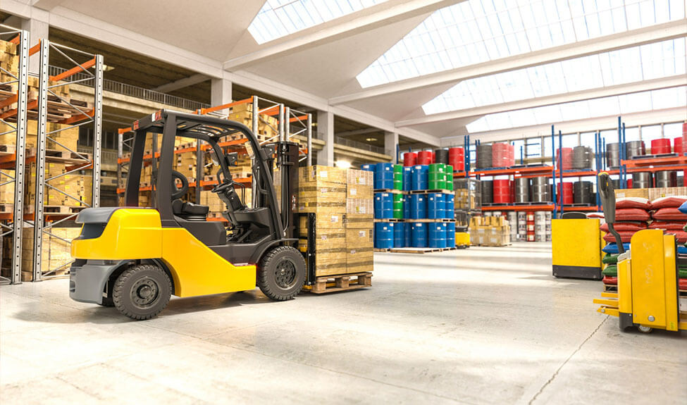 forklift truck carrying boxes in warehouse