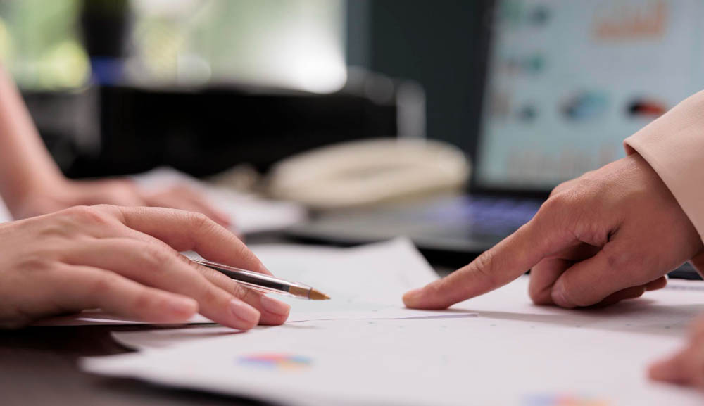 Two employees of a manpower company brainstorming ideas to enhance the business that they provide under the Agri-Manufacturing, Mining, Renewable Energy, and Facility Management